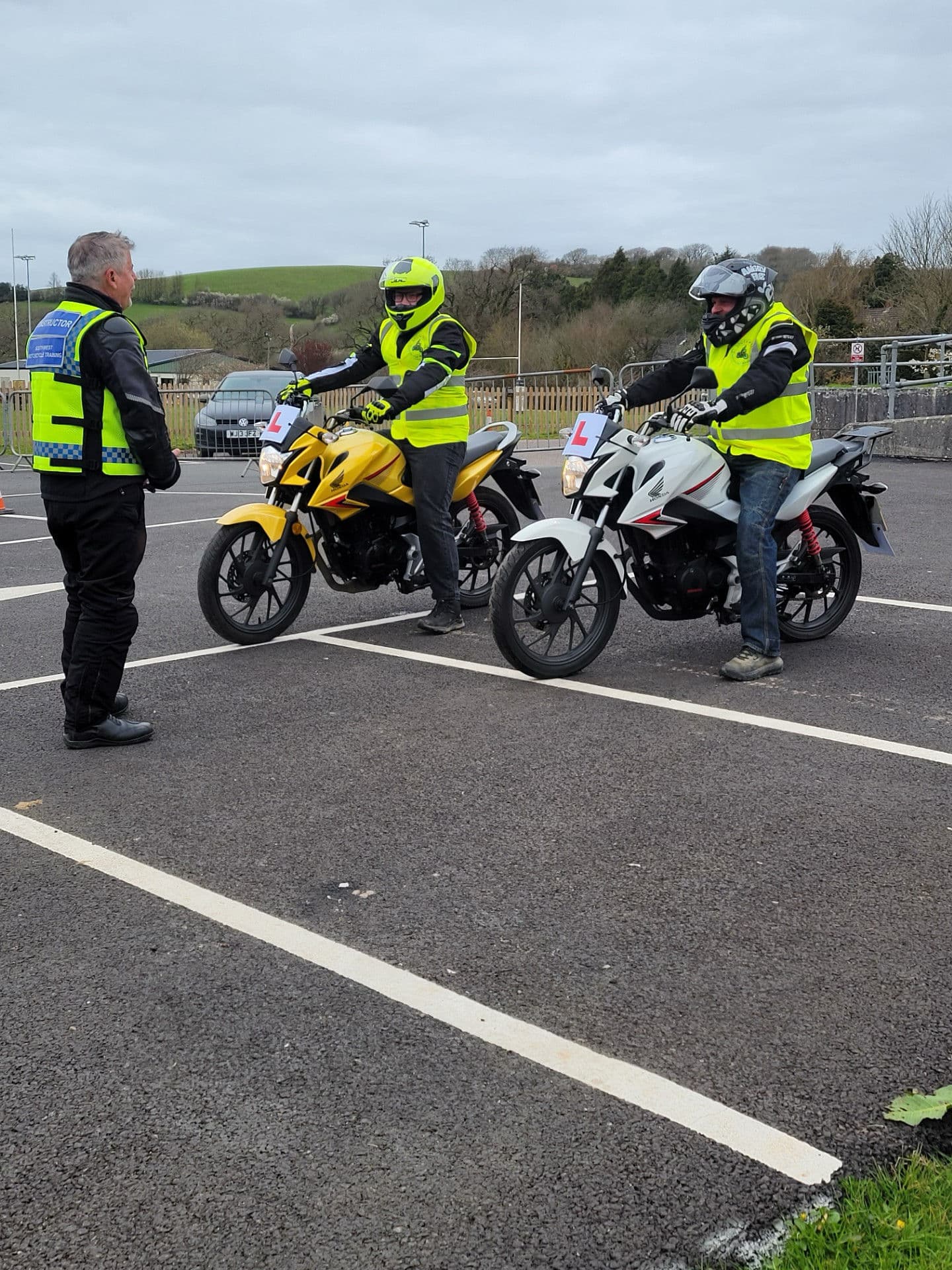 Learner riders on Honda training bikes with a South West Motorcycle Training instructor at North Tawton Learner riders on Honda training bikes with a South West Motorcycle Training instructor at North Tawton
